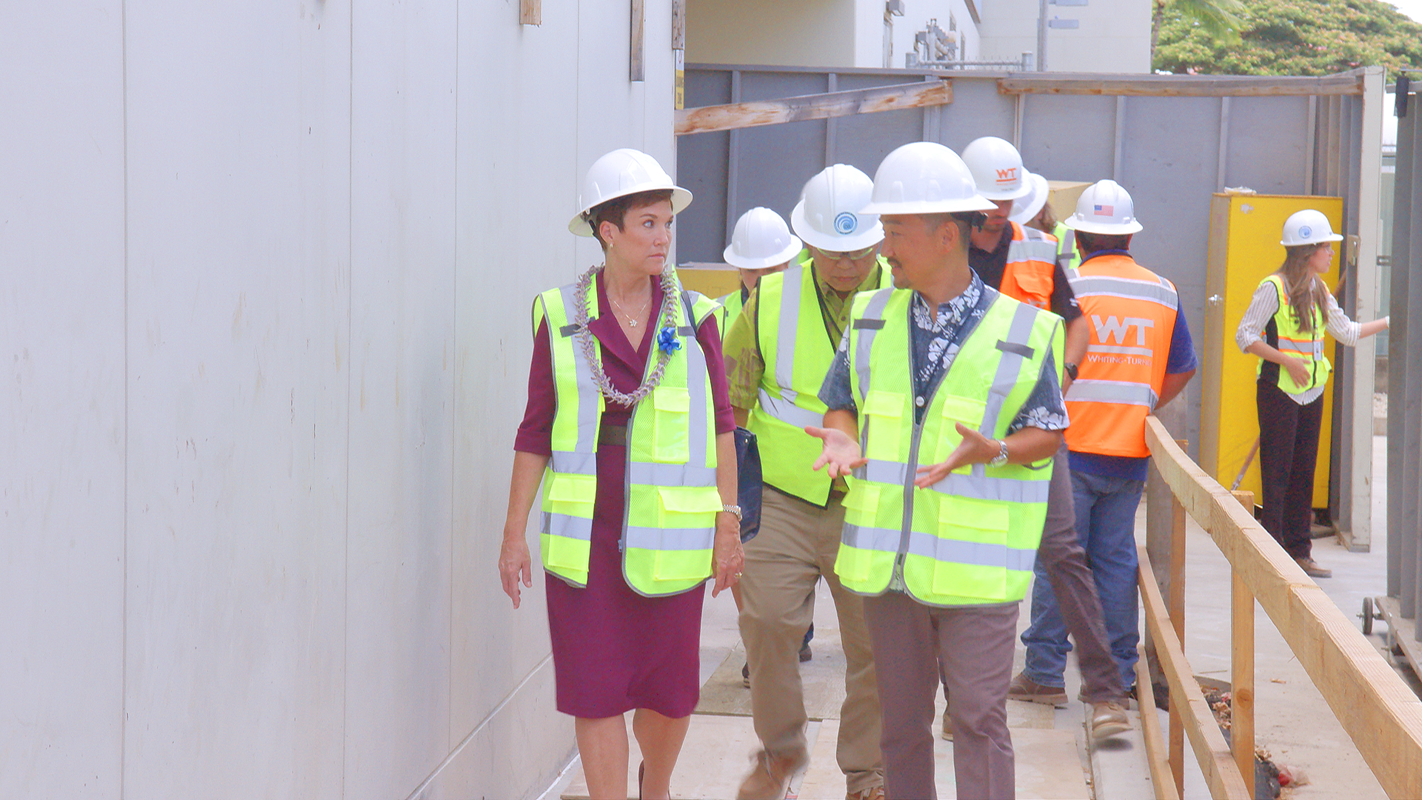 UH President Wendy Hensel with Dr. Iwase speaking